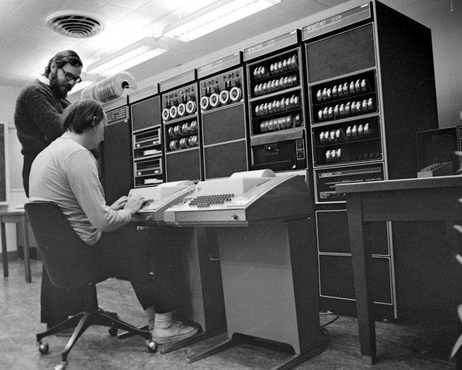 Ken (seated) and Dennis (standing) at a PDP-11 in 1972.